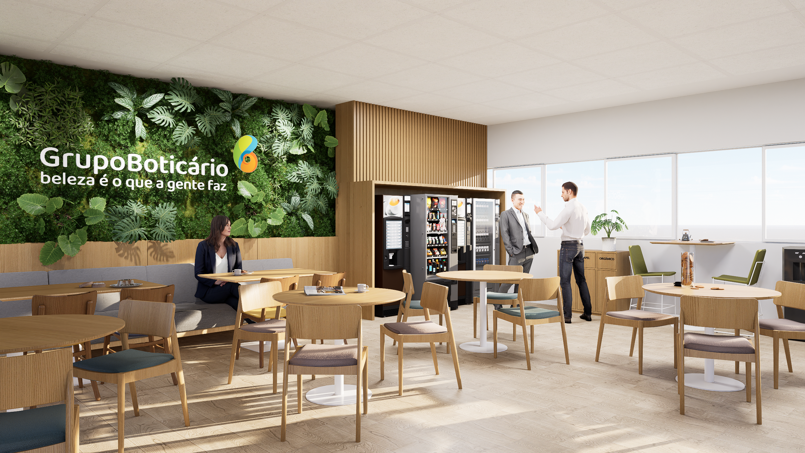 Espaço de copa corporativa com jardim vertical natural, mobiliário em madeira clara, vending machines embutidas e iluminação natural abundante.