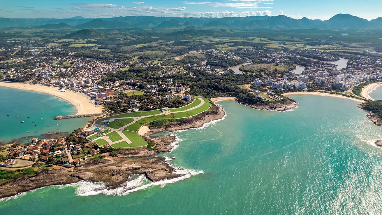 Vista aérea da Península Meaípe em Guarapari, loteamento residencial com infraestrutura urbana, fase de implantação.